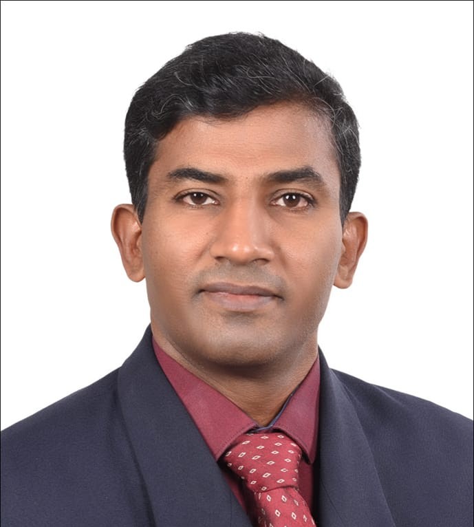 Dr. Augustine George